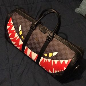Reason brand duffel bag
